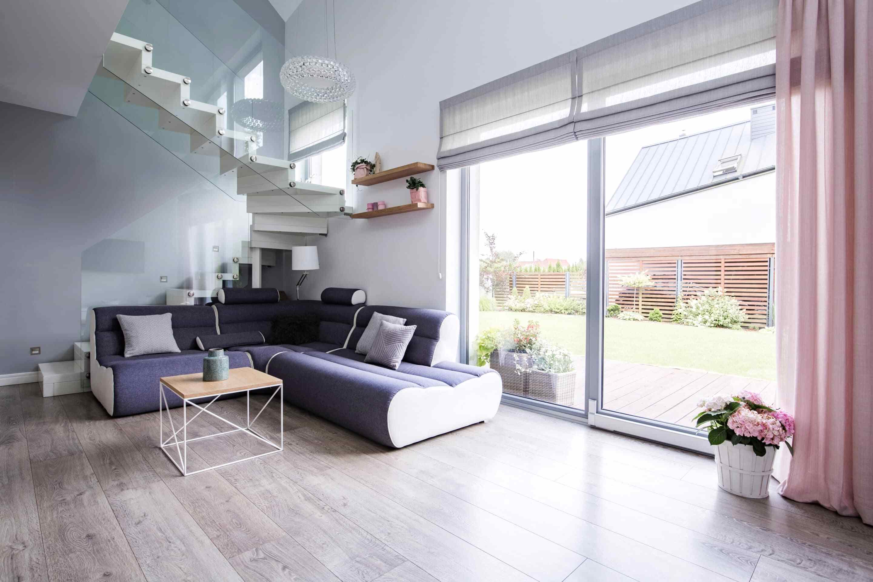 Natural Light coming through Patio Door Roman Shades and Curtains.